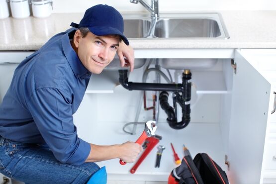 Wollaton Plumbing fixing a sink